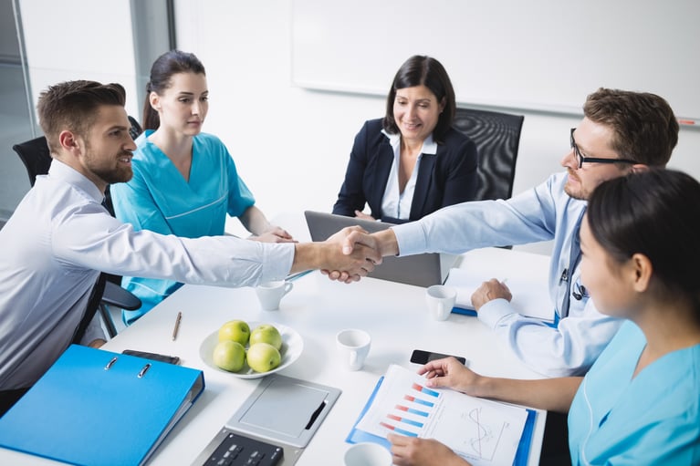 doctors-shaking-hands-with-each-other